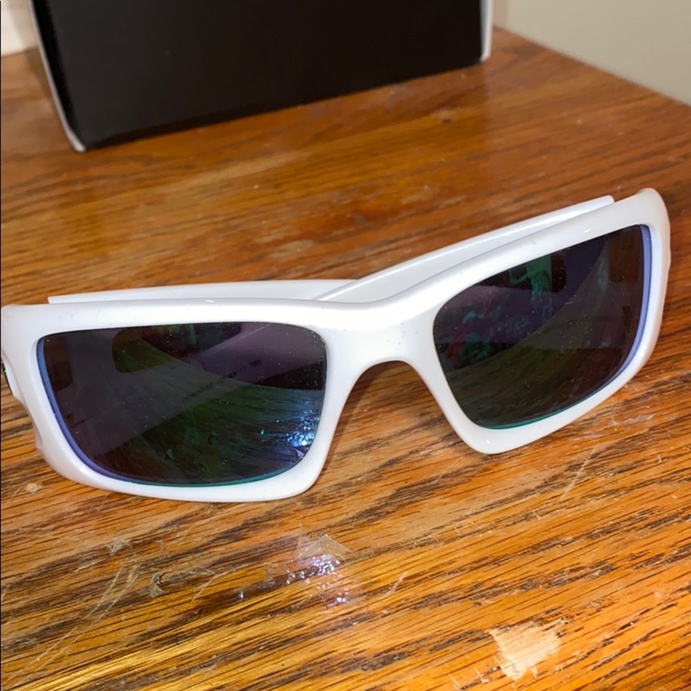 2 pairs of Oakley sunglasses